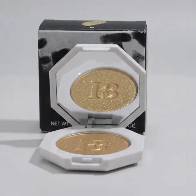 Iluminador Trophy Wife Fenty Beauty 8g Killawatt — vista giratoria del envase